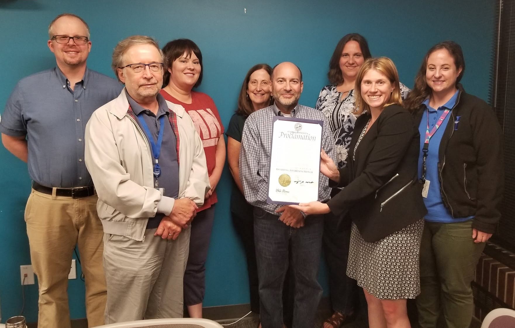 MNHTF team receiving Hoarding Awareness Month proclamation