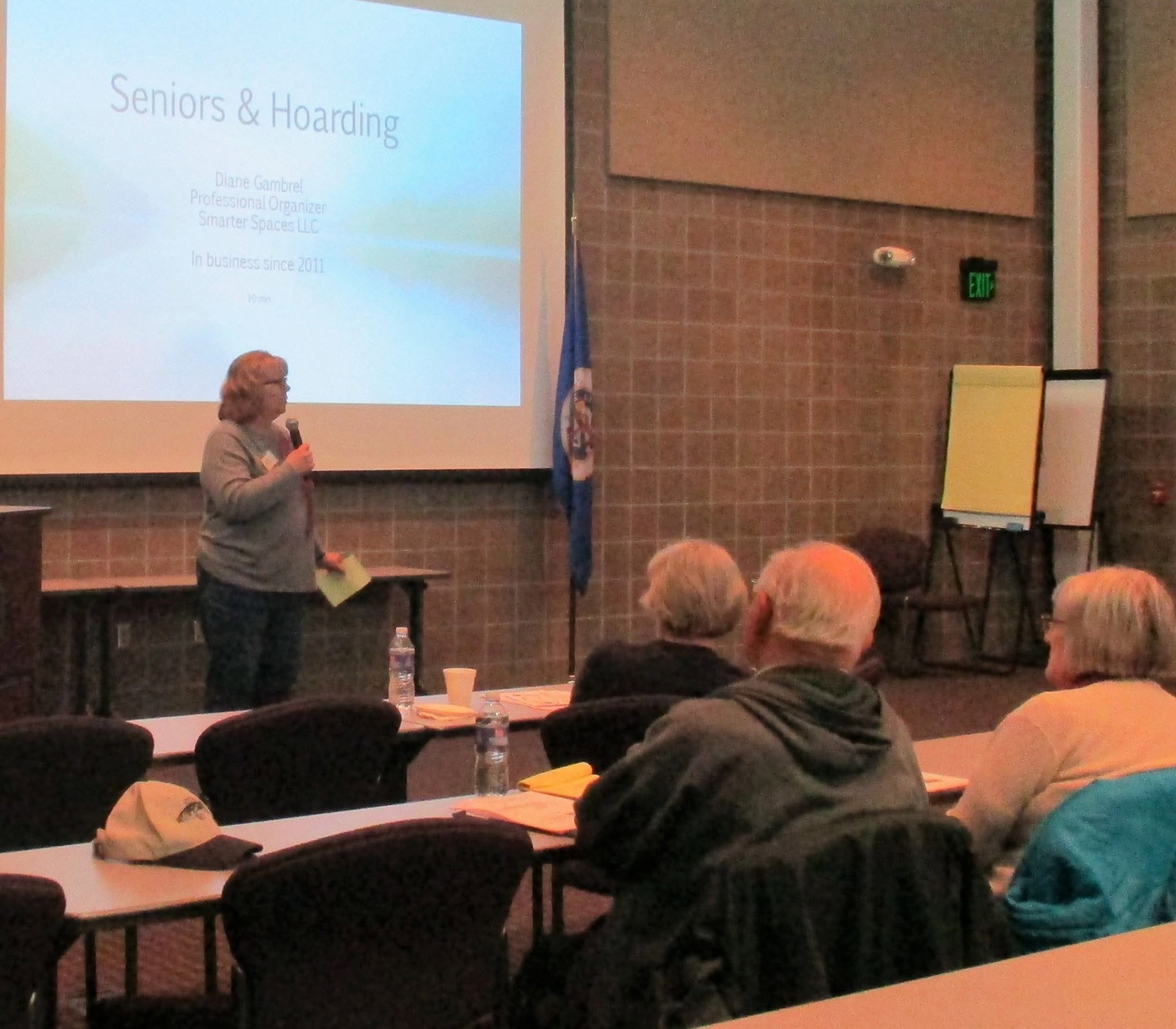 Presenter speaking to seniors about hoarding disorder